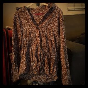 Dress shirt with leopard print.
