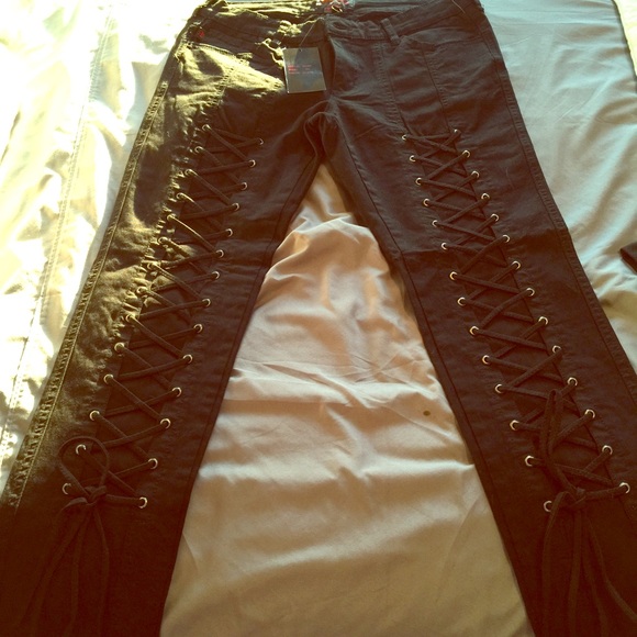 Royal bones black lace up skinnies