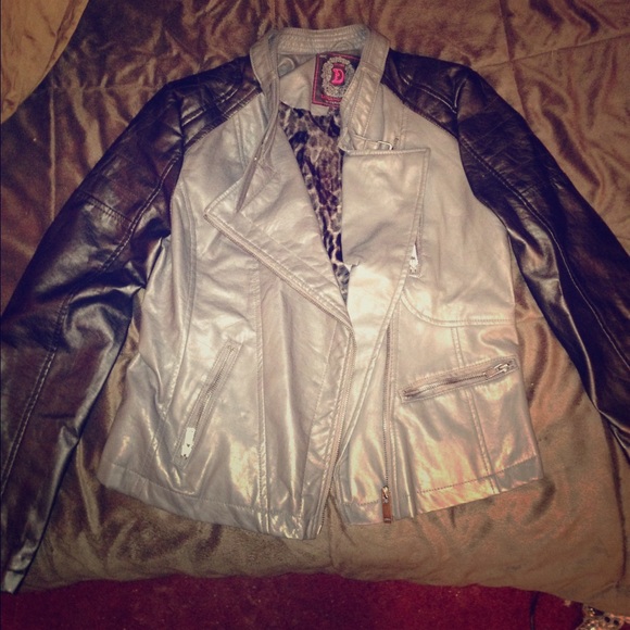 Leather jacket. Inside is leopard print.