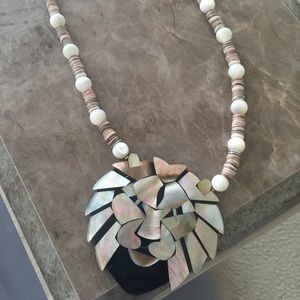 Lee Sands lion necklace