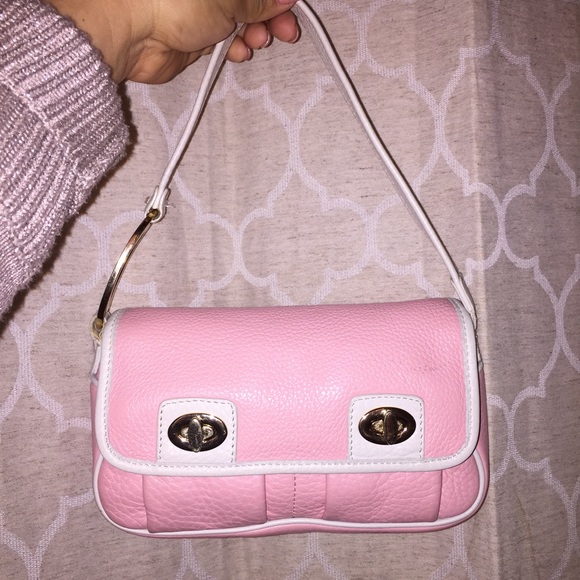 Cute pink small Antonio Melani purse super cute .