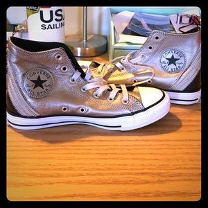 Silvery triple zipper converse