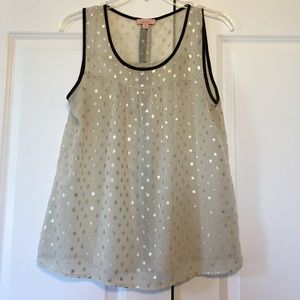 Cream colored tank with gold polka dots