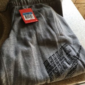 Nike sweatpants, grey.  Women's size medium NWT!