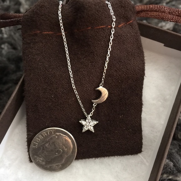 Adorable Silver Toned Moon and Star Necklace - Picture 2 of 3