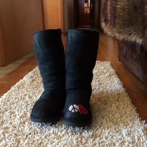Classic tall black UGGs adorned
