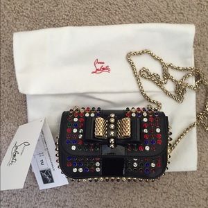 Jeweled clutch to match most of your fav Loubs