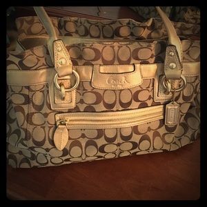 Brown with gold accents Coach purse