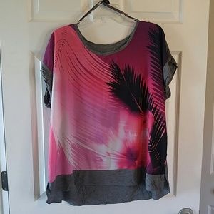 Slight hi/lo top front rayon the back is cotton.