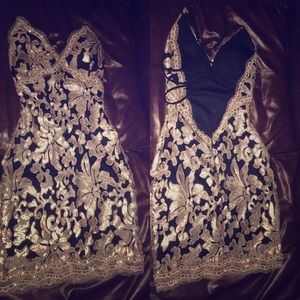Black and gold sequin mini dress