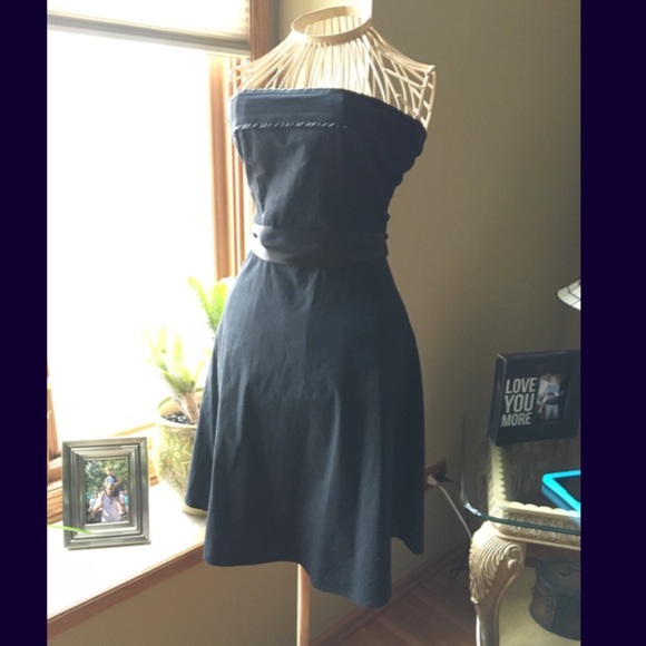 Black A-line strapless dress.