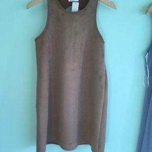 Cute and trendy suede dress with scoop back!
