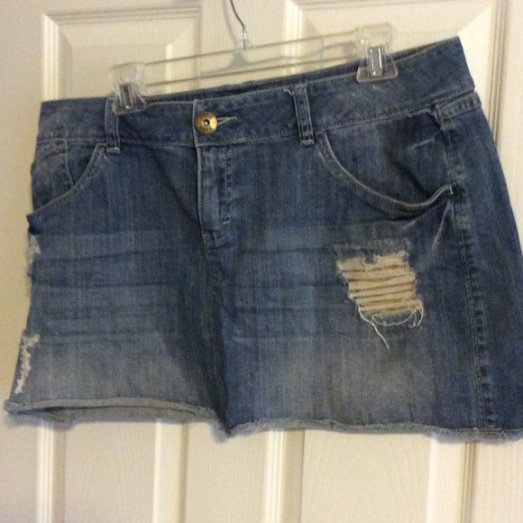 Distressed denim mini skirt