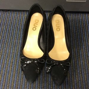 Black suede low wedge heels