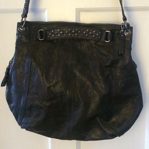 Black Leather Cross Boy with Grommet Detail