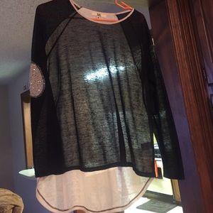 Black and white top with elbow patches