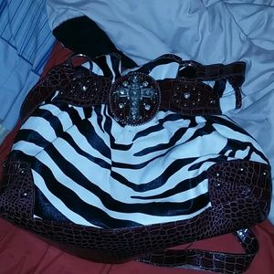 Zebra purse with cross emblem