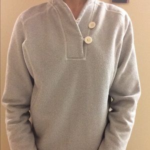 Grey and white north face pullover.
