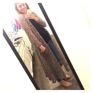 Long fishnet sweater with pockets