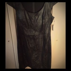 New with tags, faux leather black dress.