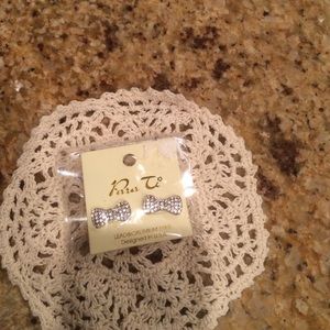 Sparkling ribbon pierced earrings. Never opened💕