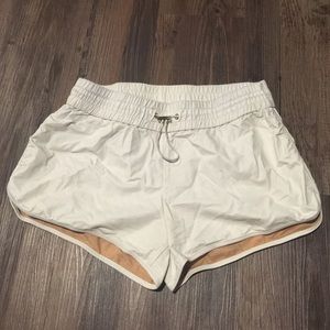 White leather shorts