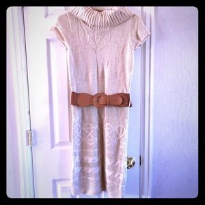 Cream dress sweater with tan belt.