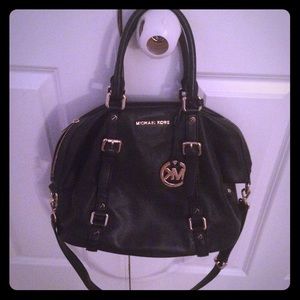 Michael Kors purse in perfect condition.