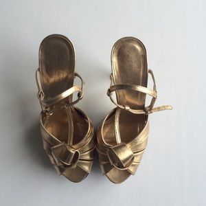 Gold Coach heels!