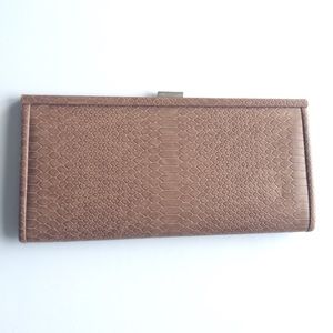 Snakeskin clutch