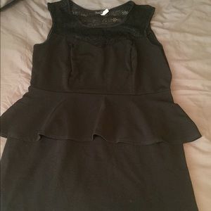 Black peplum with lace neckline