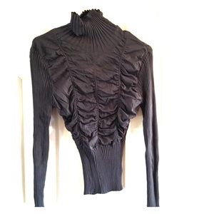 Grey long sleeve shirt.