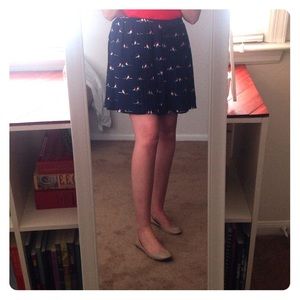 Pleated skirt with bird print