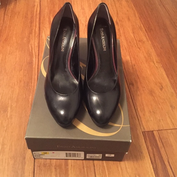 Black leather pumps