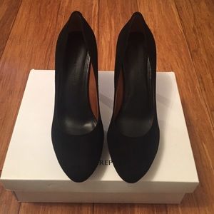 Black suede pumps