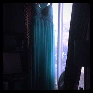 Beautiful turquoise floor length dress.