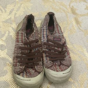 Brown and plaid slip ons