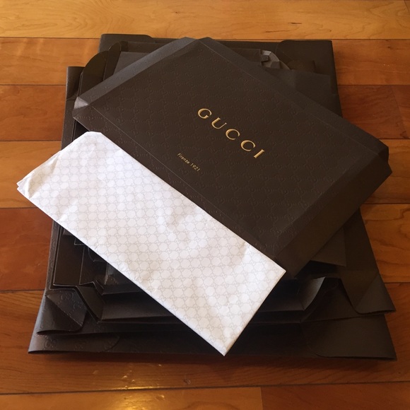 Gucci paper and 4 boxes
