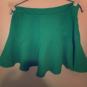 Green mini skirt.