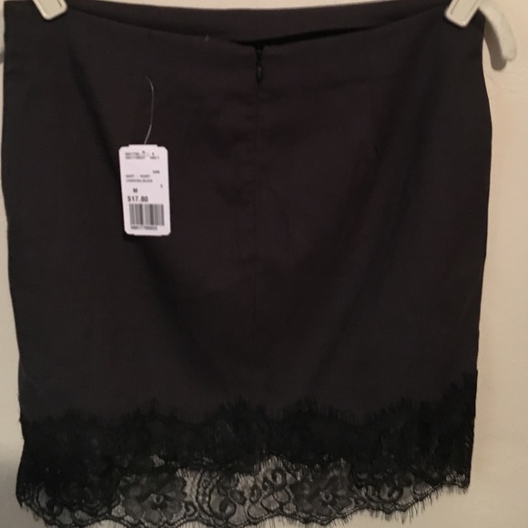 Black mini with lace. Brand new. - Picture 4 of 4