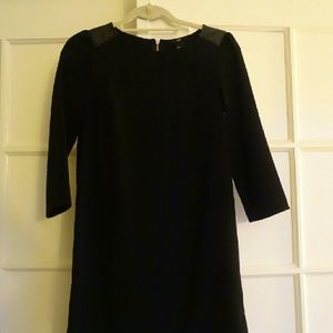 3/4 length black dress with faux leather shoulders