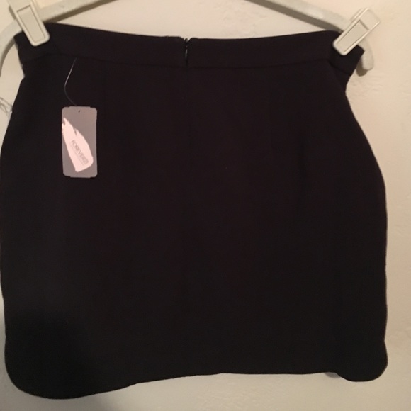 Black mini skirt. Brand new. - Picture 3 of 3