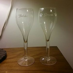 Bride and groom drinking goblets