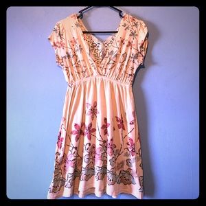 Cream colored floral dress with lace back