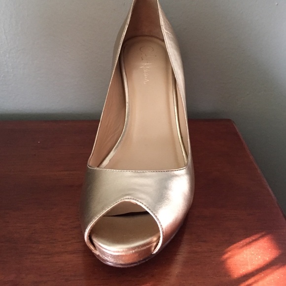 Cole Haan gold pumps