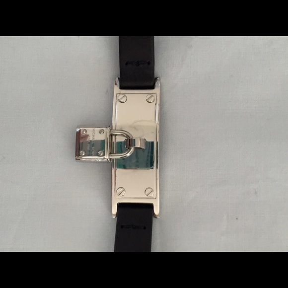 Michael Kors silver and leather bracelet.