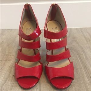 Michael Kors red pumps