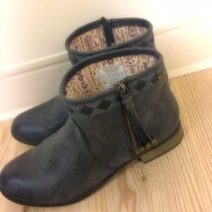 Black booties with tassel