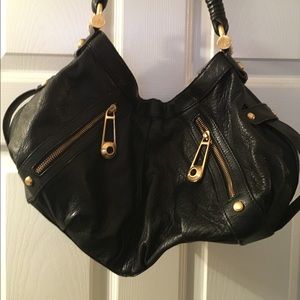 B. Makowski black leather bag