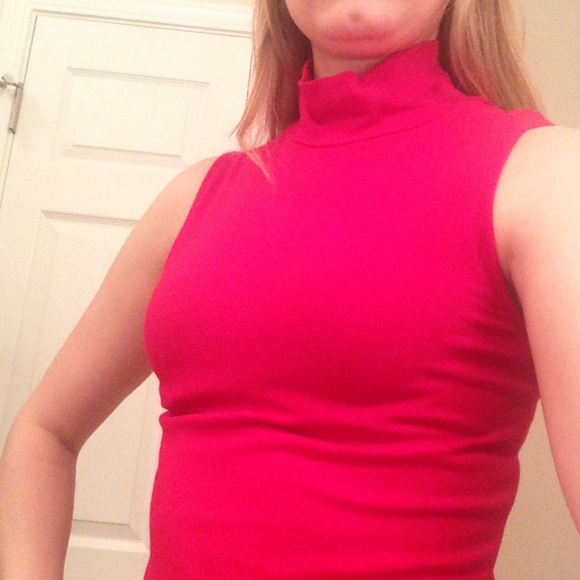 Pink turtleneck sleeveless Express tank.